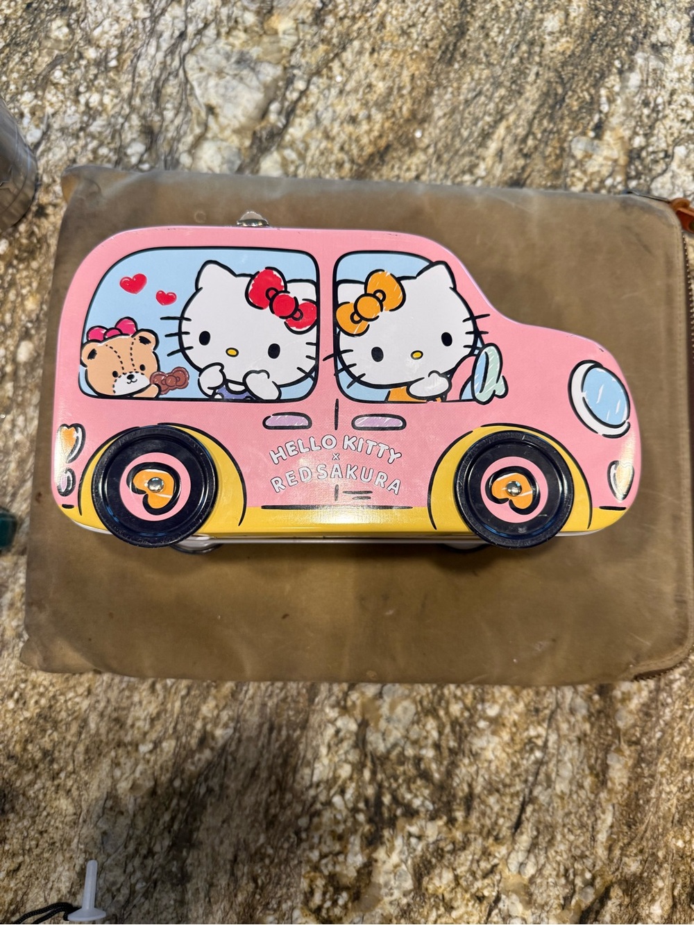 Hello Kitty Pink & Yellow Tin Bus Toy with Character Artwork